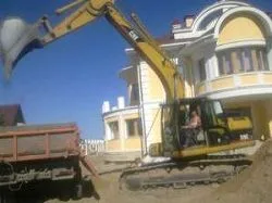 Гусеничный экскаватор Caterpillar 319C LN
