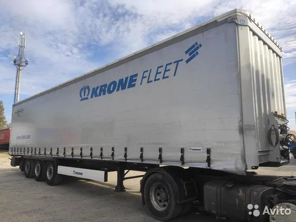 Тентованный полуприцеп Krone