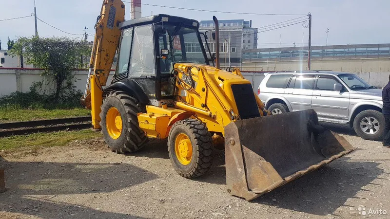 Услуги эксковатора-погрузчика