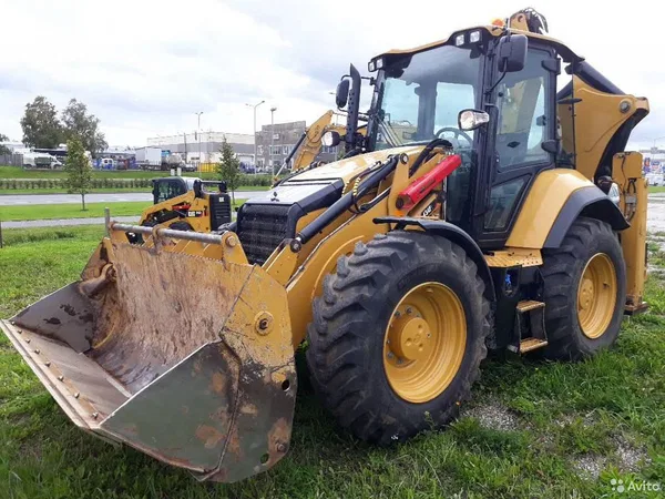 Аренда,услуги Экскаватор погрузчик Cat 434