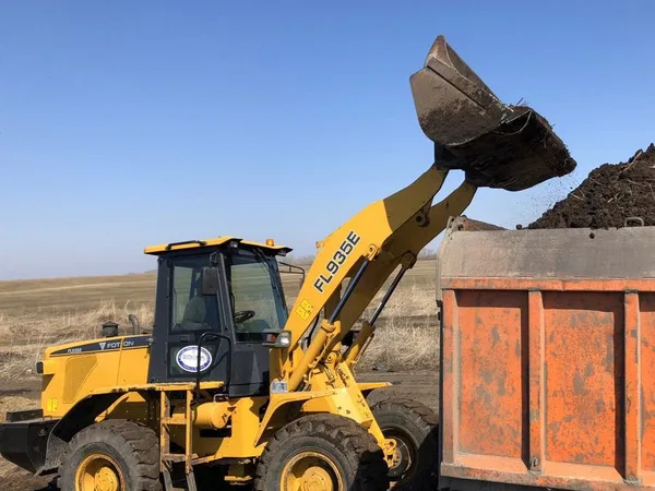 Услуги трактора фронтального погрузчика