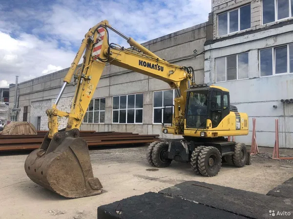 Услуги аренда колесного экскаватора Komatsu 220