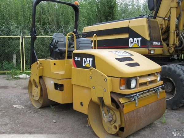Услуги асфальтового вибро катка caterpillar