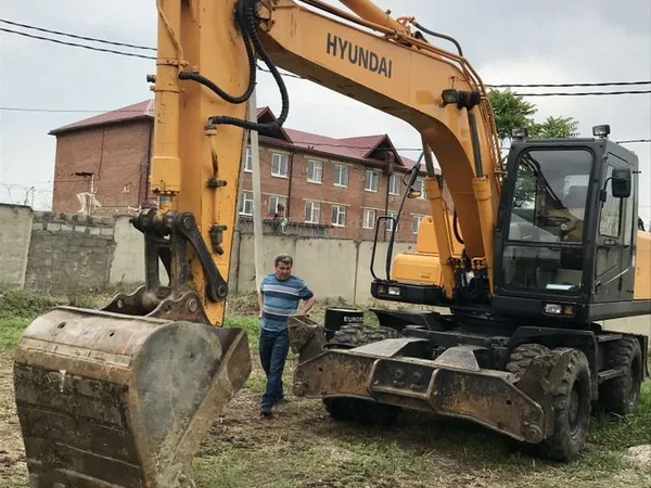 Аренда экскаватора колесного,полноповоротный,услуг