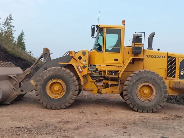 Фронтальный погрузчик Volvo L180E ковш 5.5-6 м3