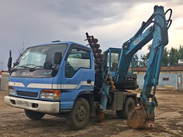 Услуги Автоэкскаватор экскаватор колесный ямобур