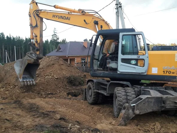 Услуги аренда колесного Экскаватора Hyundai 170