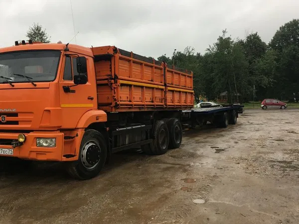 Камаз самосвал с тральным прицепом