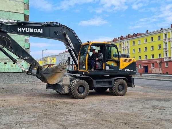 Услуги колёсного экскаватора