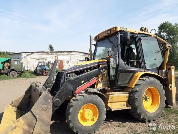 Экскаватор-погрузчик Caterpillar 424D
