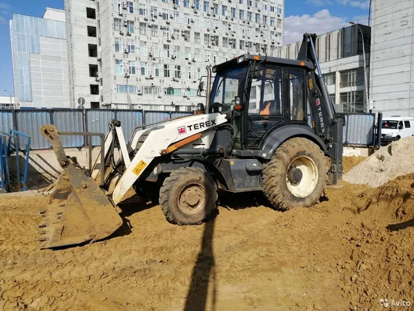 Услуги экскаватора-погрузчика