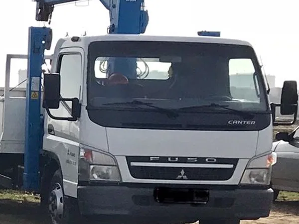 Бортовой грузовик с КМУ Mitsubishi Fuso Canter