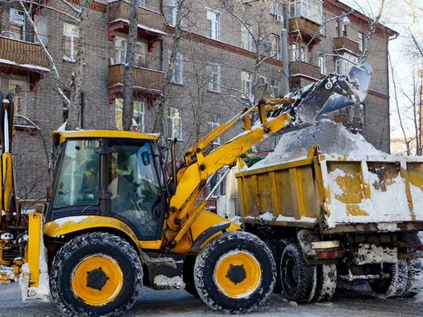 Аренда экскаватора погрузчика.Уборка снега.Погрузк
