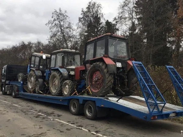 Перевозка тракторов мтз - JCB