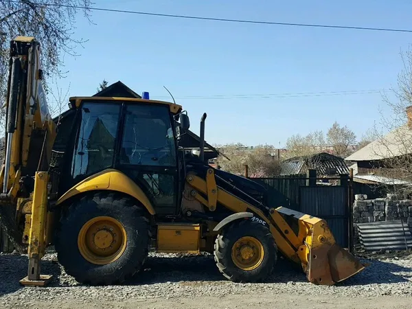 Услуги экскаватора-погрузчика CAT428, гидромолот