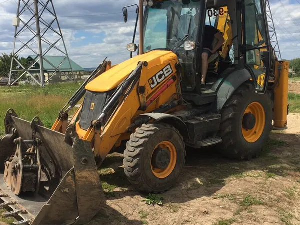 Услуги экскаватора-погрузчика JCB