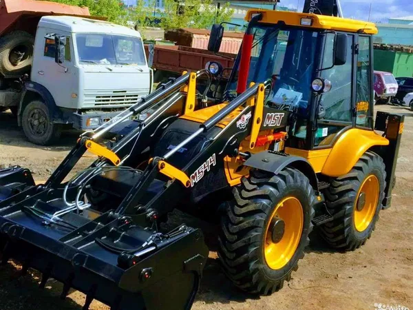 Услуги экскаватора погрузчика MST544s + гидромолот