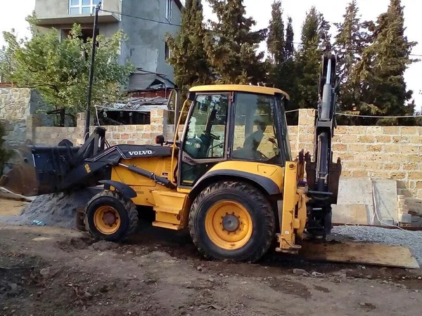 Услуги экскаватора погрузчика
