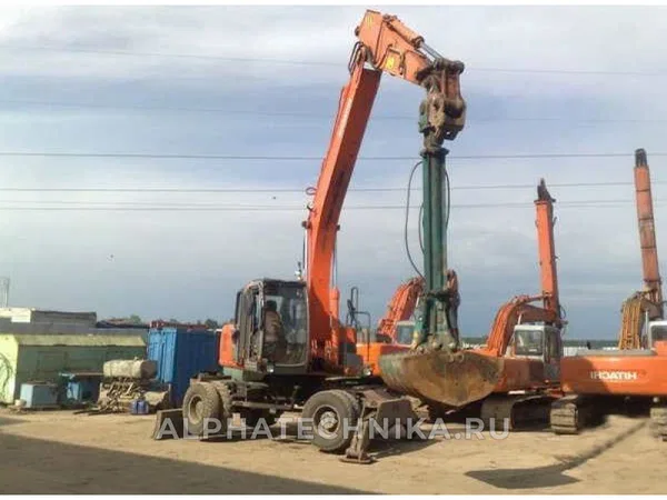 Колесный экскаватор Hitachi ZX210W-G с грейферным ковшом