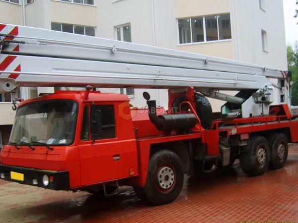 Средневысотная автовышка                                                     Caterpillar                                                 Ural