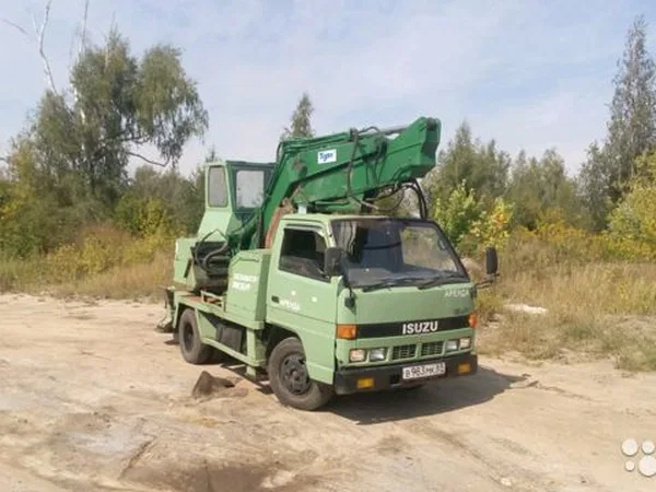 Экскаватор-планировщик Isuzu ELF