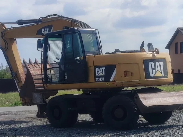 Колесный экскаватор Caterpillar D 315 M