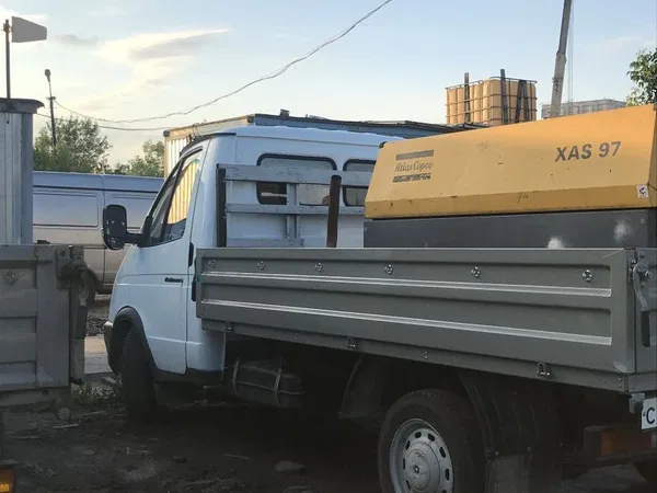 Услуги компрессора с отбойными молотками