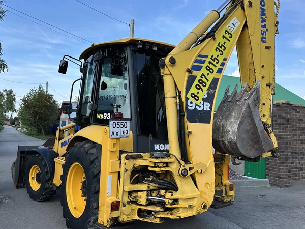 Экскаватор-погрузчик Komatsu WB93R-5