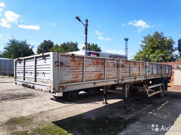 Бортовой полуприцеп МАЗ 93802