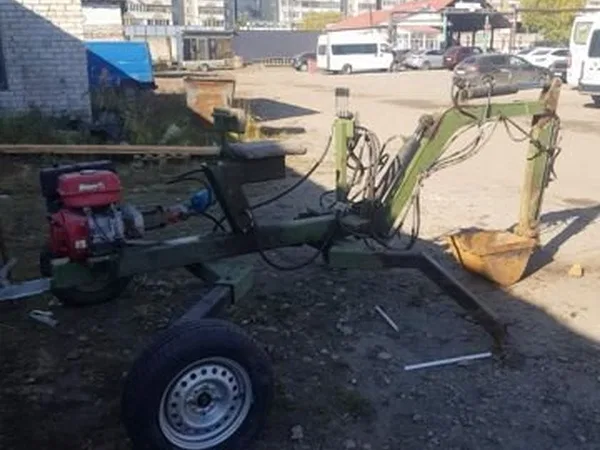 Прицепной экскаватор