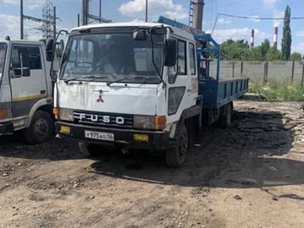 Бортовой грузовик с КМУ Mitsubishi Fuso Canter