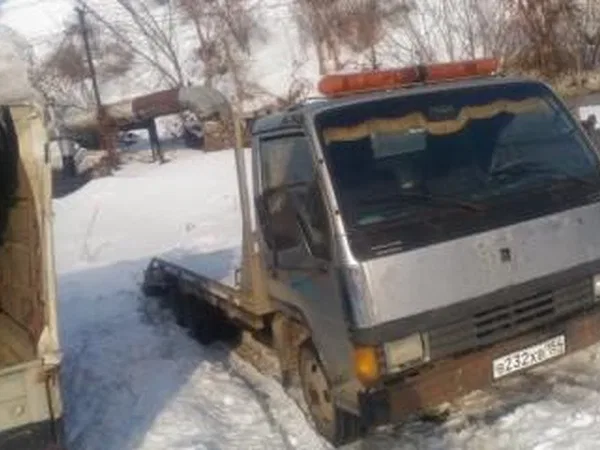 Эвакуатор Mitsubishi Fuso Canter