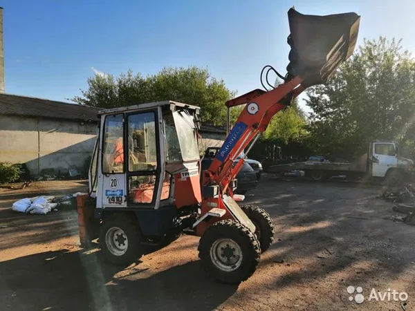 Экскаватор-погрузчик Kubota R410