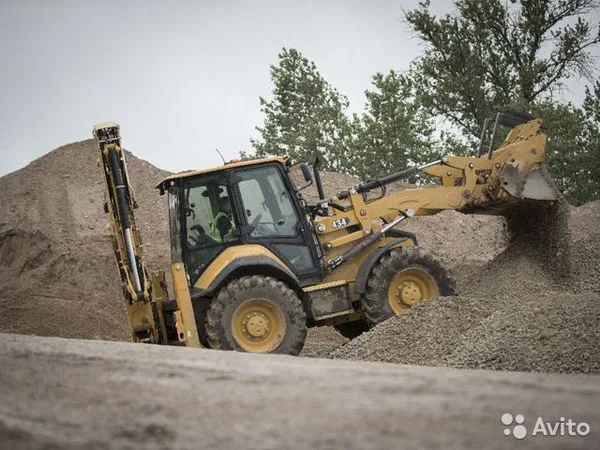 Экскаватор-погрузчик Caterpillar 434