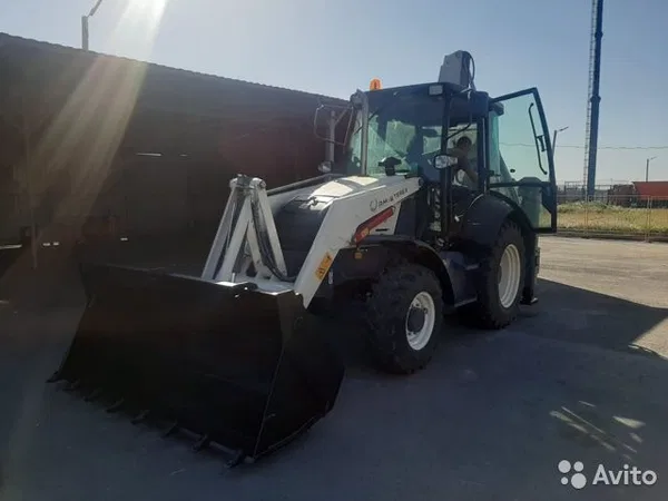 Экскаватор-Погрузчик Terex TLB 825-RM