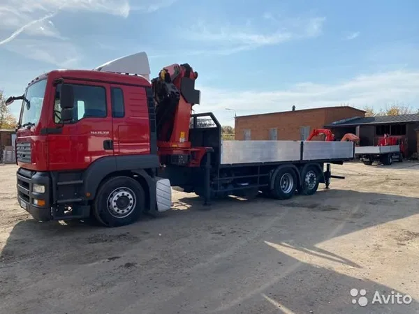 Бортовой грузовик с КМУ MAN TGA 26.350