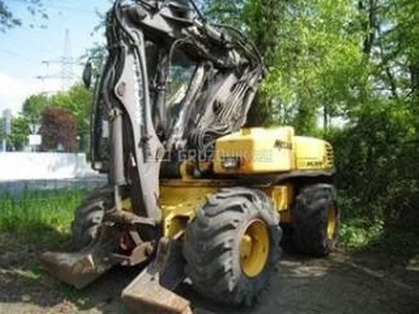 Колесный экскаватор Mecalac 12MXT