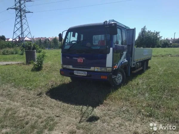 Бортовой грузовик с КМУ Nissan Diesel UD с КМУ Tadano ZF303