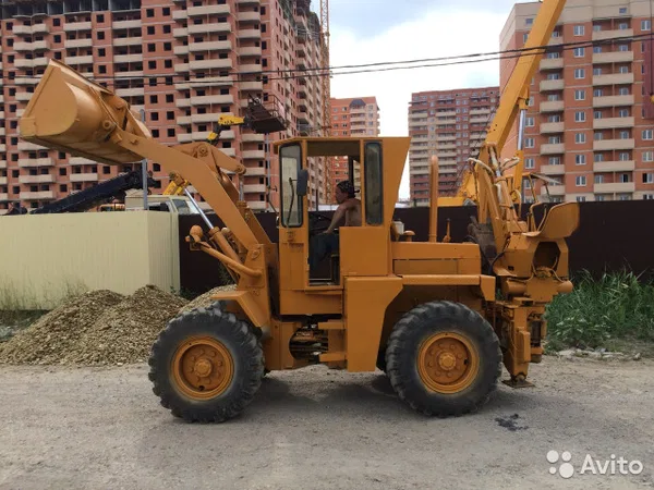 Экскаватор-погрузчик Mitsubishi WS 400