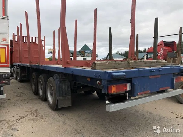 Полуприцеп сортиментовоз МАЗ с кониками