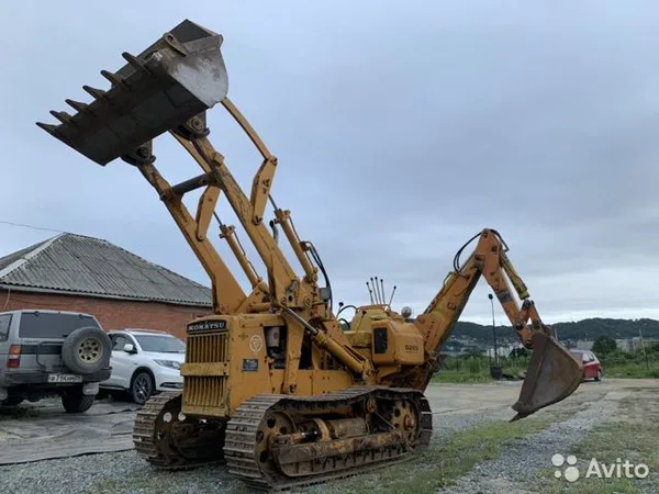 Экскаватор-погрузчик Komatsu D20s-2 (гусеничный)