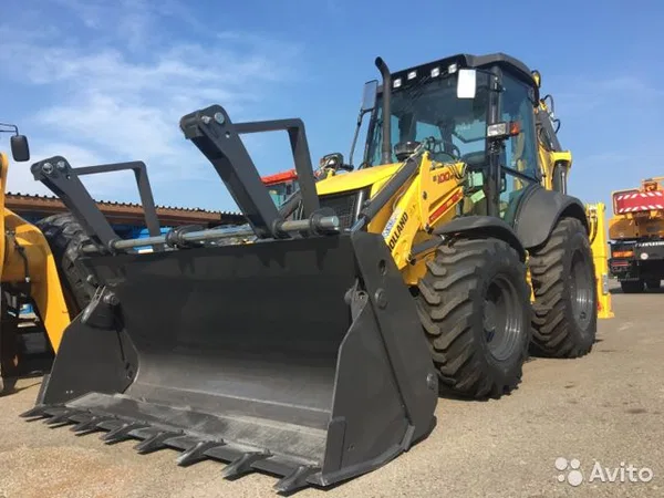 Экскаватор-погрузчик New Holland B100B