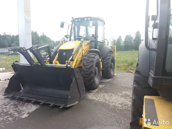 Экскаватор-погрузчик New Holland B115B