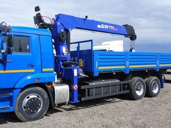 Бортовой грузовик с КМУ КамАЗ 65117 с КМУ DongYang SS1956