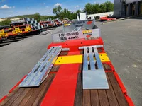 4-x осный низкopамный раздвижной тpал MАNАС с двумя поворoтными оcями (пepвaя и чeтвертая)