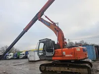 Гусеничный грейферный экскаватор Hitachi EX225USR LC