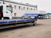 Полуприцеп трал LUXUDA LZC9404TDP 4 оси, пневмоподвеска, ленивая передняя ось, 42,3 тонны, 16.5*2.55 с уширителями до 3м, гидравлические сходни