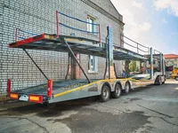 Полуприцеп автовоз на 9 автомобилей LUXUDA LZC9407BG 3 оси SAF (пневмоподвеска, ленивая передняя ось)
