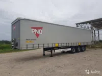Тентованный полуприцеп Krone