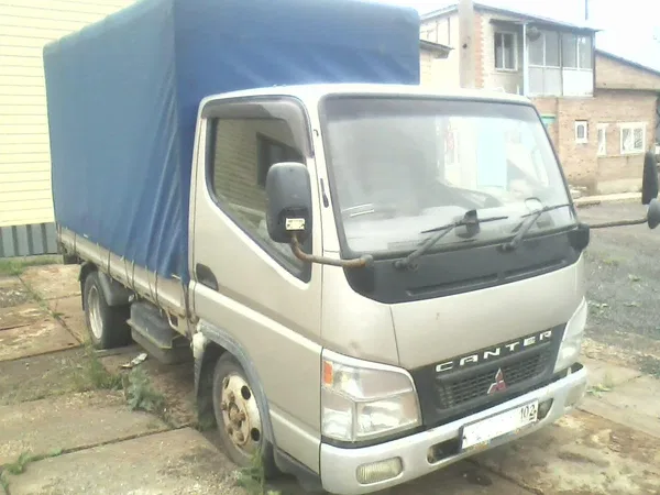Тентованный автомобиль Mitsubishi Canter